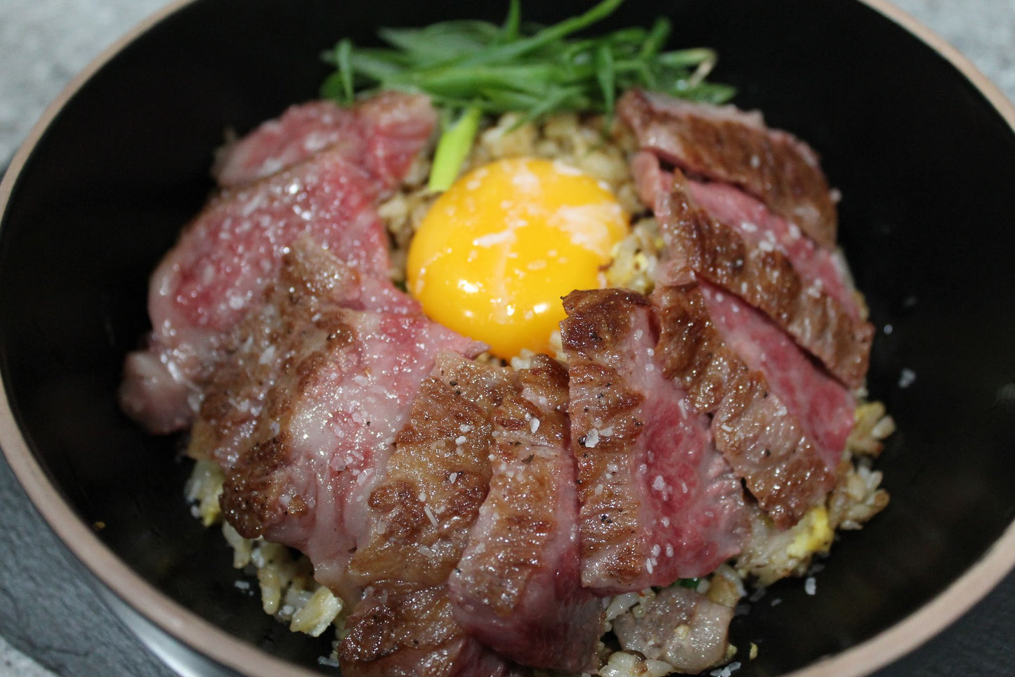 Samurai Beef Donburi w/ pasteurized egg yolk & Samurai beef garlic fried rice.
