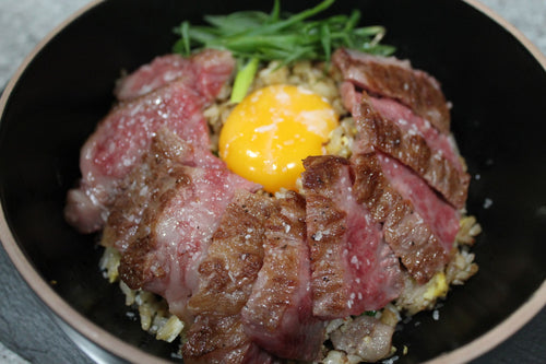 Samurai Beef Donburi w/ pasteurized egg yolk & Samurai beef garlic fried rice. 